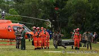 Boots on the ground as first Australian rescue team arrives in Nepal
