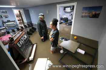 Insurance money spent, family waits for provincial flood aid