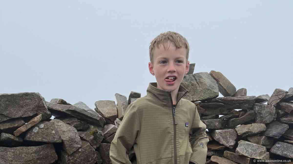 Boy, 8, completes one of the UK's toughest mountain challenges in extraordinary achievement
