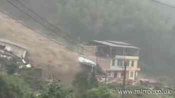 Multiple people buried alive by landslide in China as rescue teams race to scene