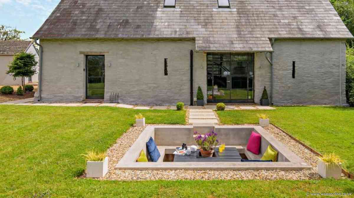 'Luxurious' barn conversion with 'expansive' Black Mountain views and quirky garden