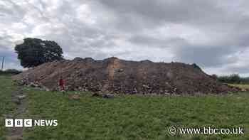 Tonnes of rubble including 'bits of old toilets' being dumped in village, residents claim