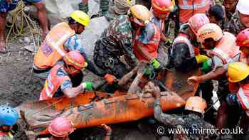Survivors pulled alive from flooded Nepal tunnel after more than a week trapped