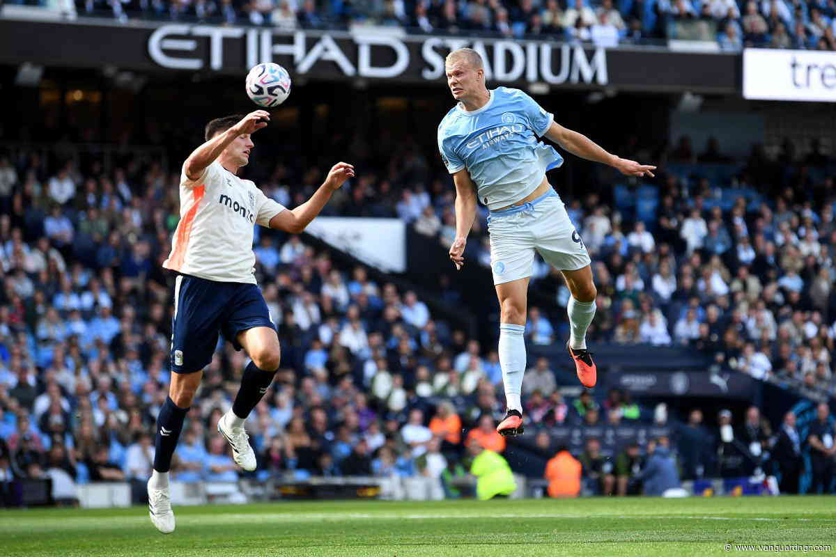 Haaland heads unconvincing Man City top of Premier League