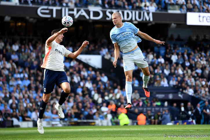 Haaland heads unconvincing Man City top of Premier League