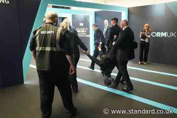 Police seek Reform UK conference protester after footage shows audience pulling her hair