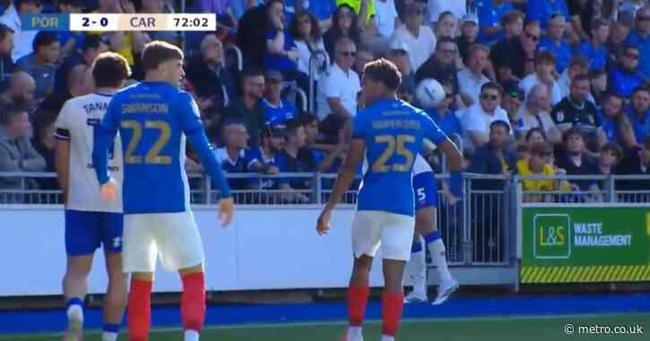 Krystian Bielik grabs Portsmouth fan by the throat in Cardiff City defeat