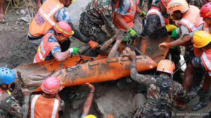Trapped Nepal workers pulled alive from tunnel 9 days after deadly flooding, raising hope for more rescues