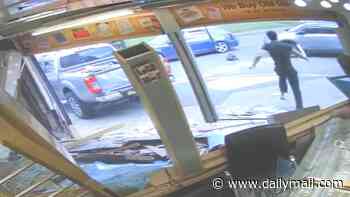 Moment jewellers with customers inside is ram raided by 4x4 - before bat-wielding owner sends masked gang fleeing empty-handed
