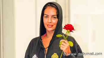 Newlywed Georgina Rodriguez clutches a red rose as she leaves Venice in a £1,000 Balenciaga hoodie