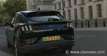 Watch: CBS News reporter tests out autonomous, AI-powered Uber in London