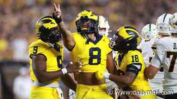 Michigan score remarkable last-second Hail Mary to avoid one of the biggest upsets in college football history in wild scenes