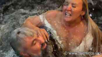 Bride and groom end up in river after accident taking wedding photographs