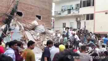 Delhi building collapses 'trapping at least 50 students' as rescue crews swarm scene