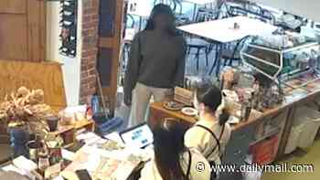 Shocking moment four customers dine and dash at Melbourne café - only to return to pick up a phone they left and walk out on the bill again