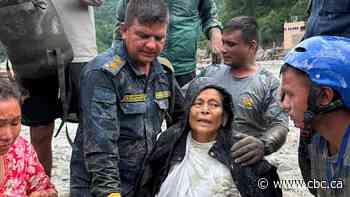Woman found alive in home destroyed by Nepal flood, days after family began mourning rites