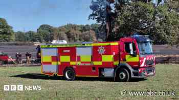 Fire ravages field near small village