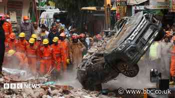 Dozens feared trapped in collapsed building in Delhi