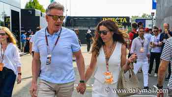 F1 superfan Gordon Ramsay holds hands with his glamorous wife Tana as they enjoy a day out at the Italian Grand Prix