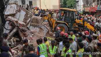 At least three killed and dozens feared trapped after building collapses in India