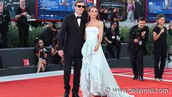Alicia Vikander wows in a blue ruffled gown as she and husband Michael Fassbender lead the stars at The Echo Chamber premiere during the 83rd Venice Film Festival