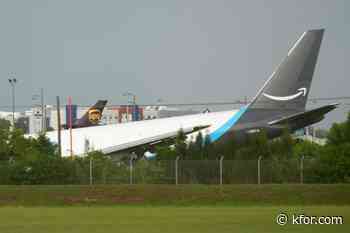 Amazon cargo plane sends up billowing cloud of smoke after overrunning runway at Miami airport