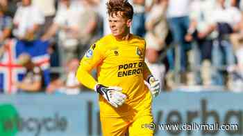 Goalkeeping son of former Premier League manager scores TWICE to save a draw... but can YOU guess who his famous father is?