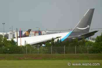 Amazon cargo plane sends up billowing cloud of smoke after overrunning runway at Miami airport