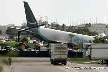 Amazon-branded cargo plane overruns runway at Miami airport, strikes multiple vehicles