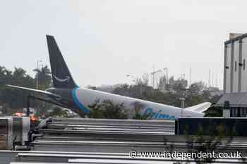 Five dead after Amazon cargo plane overshoots runway and crashes during landing at Miami airport
