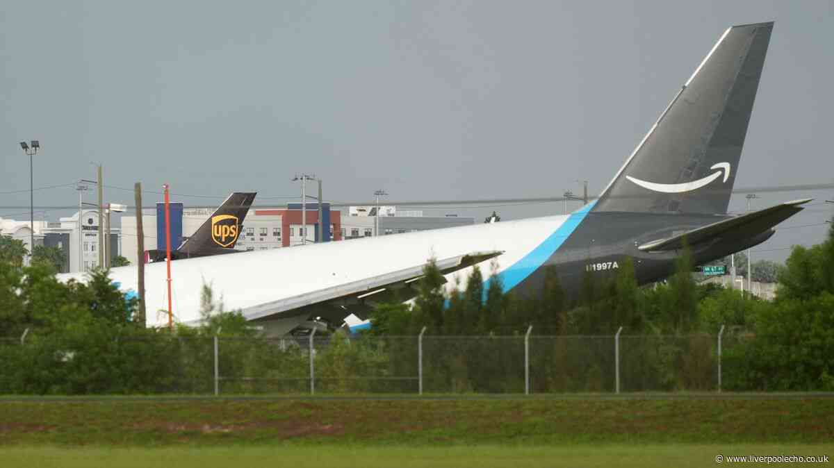 At least 5 dead after Amazon cargo plane veers off runway and bursts into flames