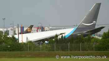 At least 5 dead after Amazon cargo plane veers off runway and bursts into flames