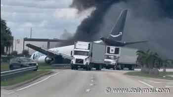 Harrowing audio reveals fire crews racing to Amazon cargo plane crash in Miami that left five dead and five injured