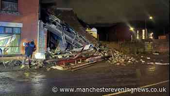 Car smashes into shop as building collapses leaving scene of devastation