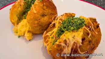 I can make baked potatoes taste better by adding one ingredient to the tray before cooking