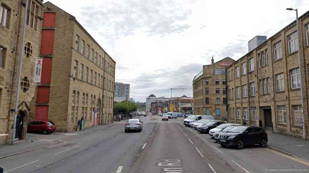 Huge police scene as woman's body found in notorious block of flats