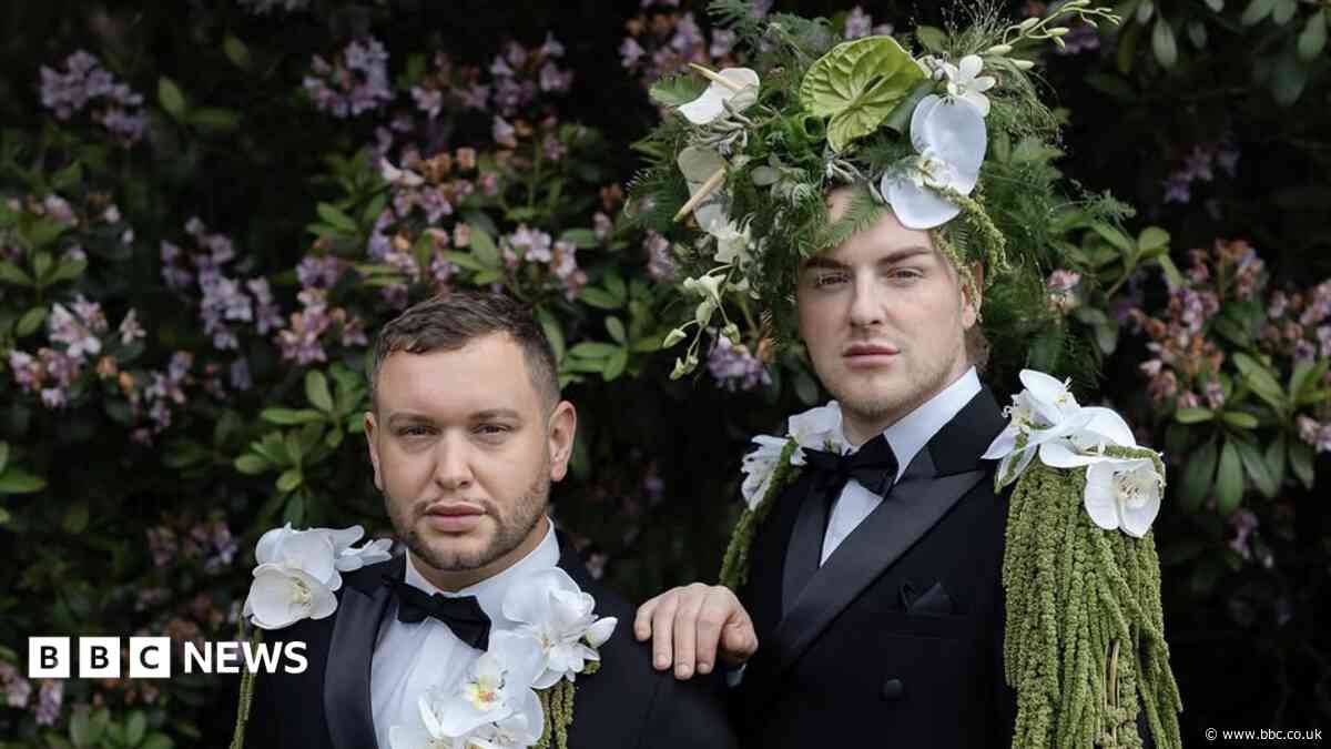 Dads face homophobic abuse over wedding photos