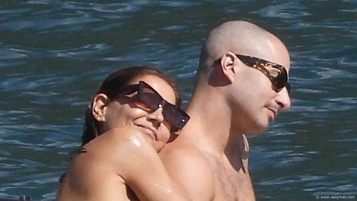 Bikini-clad Katie Holmes, 47, KISSES boytoy Jason Bard Yarmosky, 39, as romance heats up during Lake Como getaway