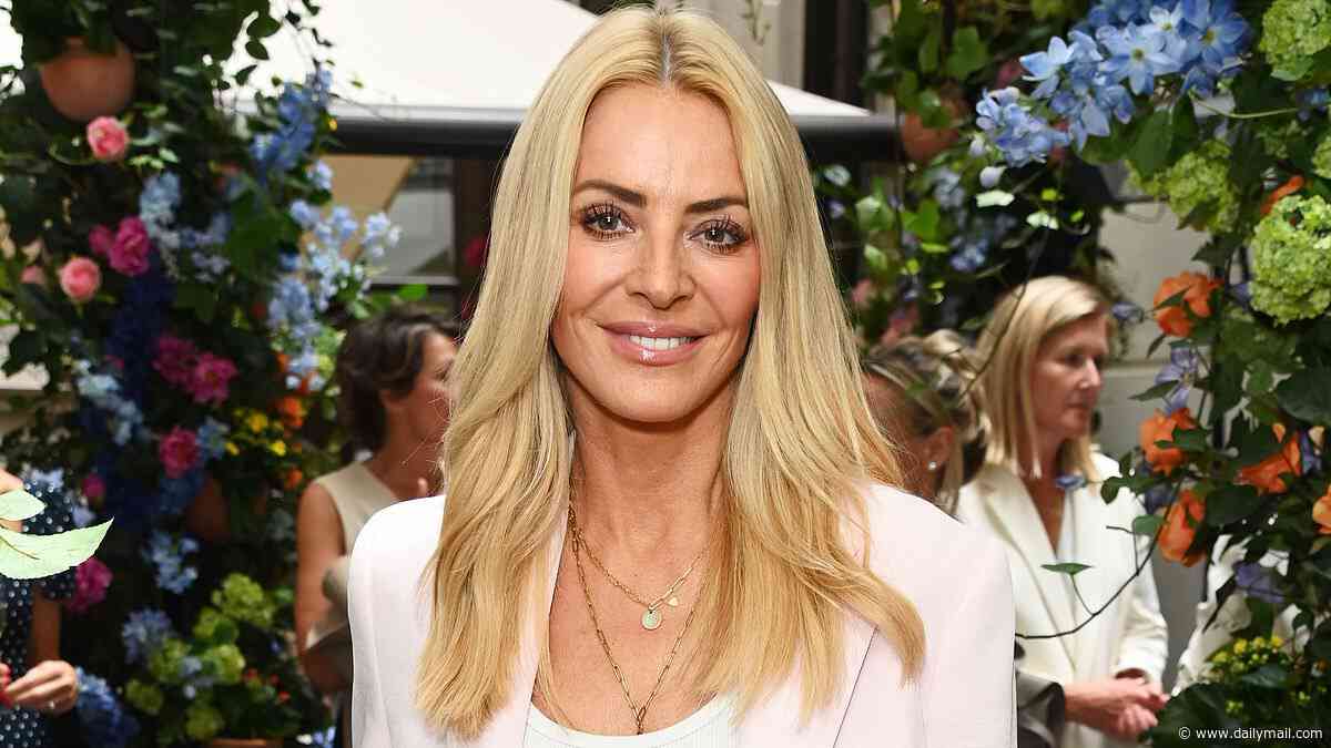 Tess Daly ditches her wedding ring as she returns to London after French holiday with estranged husband Vernon Kay and their daughters