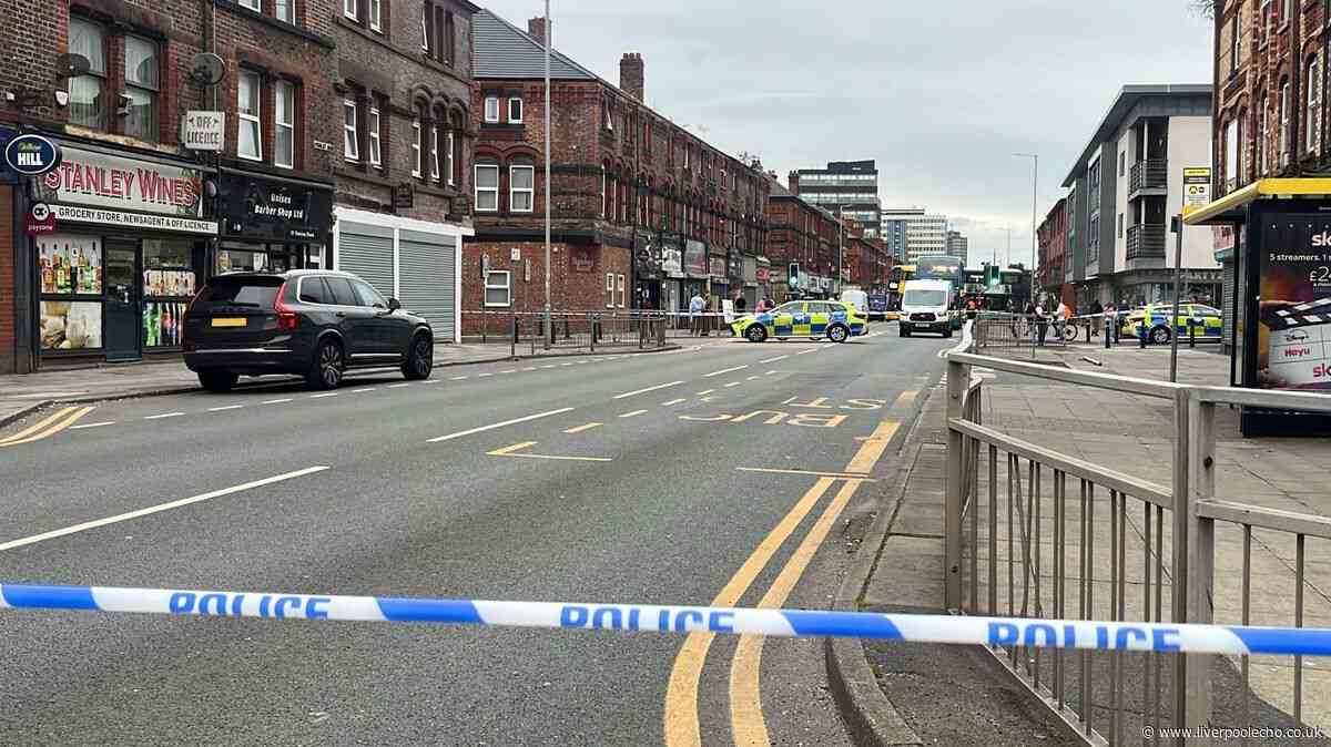 Bootle police incident live as busy road cordoned off