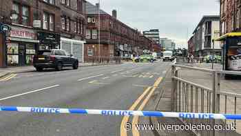 Bootle police incident live as busy road cordoned off
