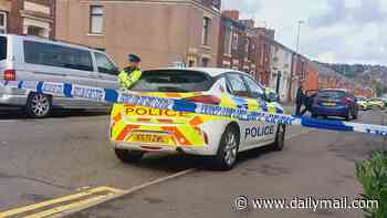 Couple are found stabbed to death at home in Blackburn: Man in his 40s is arrested