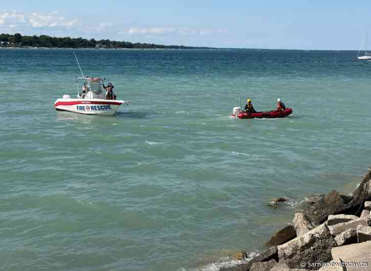 Officials searching for a missing swimmer in Lake Huron