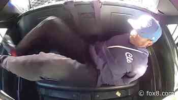 WATCH: Suspect kicks door, makes threats in back of Cleveland police car
