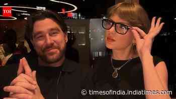 Taylor-Travis SPOTTED on date night at Indian restaurant— WATCH