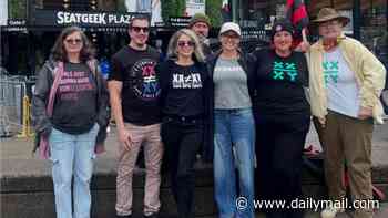 Women's soccer erupts in trans row as group of fans are ejected from NWSL clash over 'XX-XY' t-shirts... amid WNBA's ongoing culture war