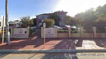 Boy is hit by a car outside a Perth primary school as emergency services race to scene