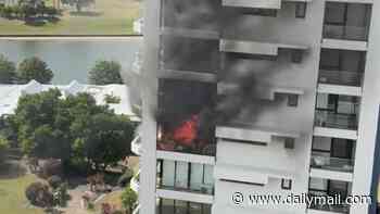 Residents flee Gold Coast apartment tower as balcony fire erupts