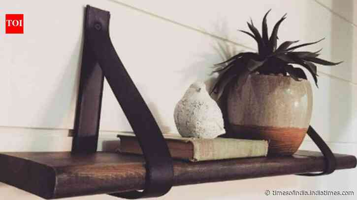Turn Belts Into Shelf Brackets: Upcycle old leather into chic shelf supports; save money and add style