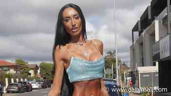 Australian influencer who underwent controversial 'Barbie waist' surgery hits back at cruel trolls who said she looks 'unrecognisable' and 'like a Holocaust survivor'